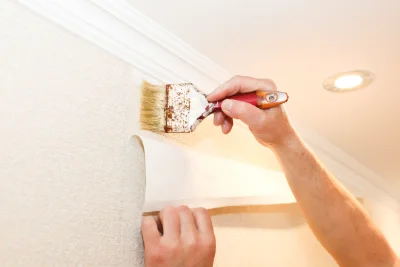 Pose de papier peint à la Porte du Der — revêtements muraux et toiles de verre
